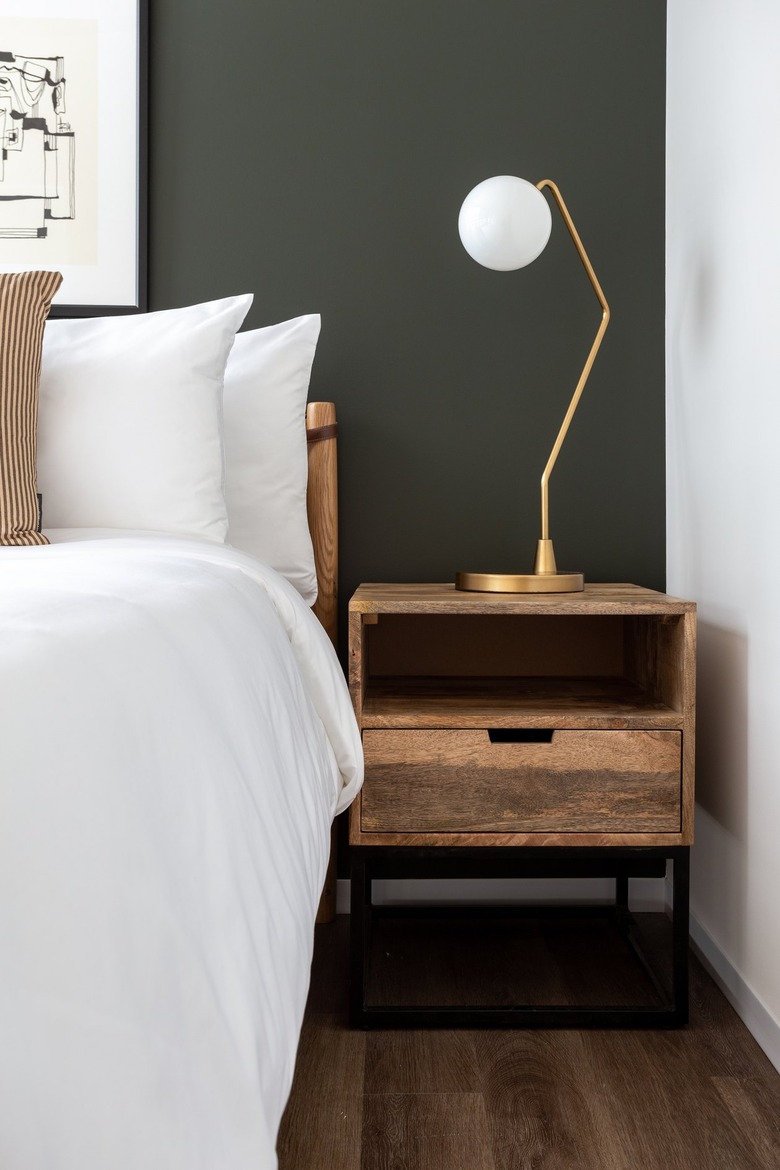 Modern bedroom with rustic nightstand